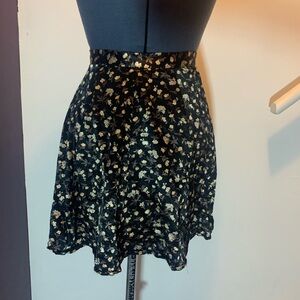 Vintage floral satin mini skirt. Star C.C.C. Brand size 5-fits like x-small.